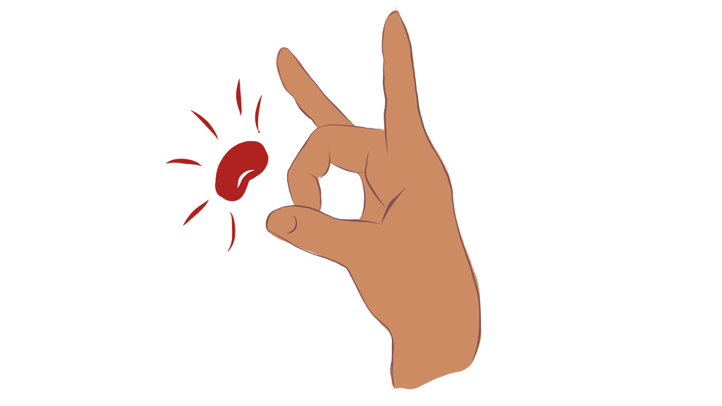 A hand flicking a kidney bean.